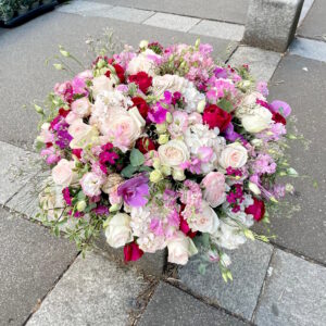 Coussin rond fleuri pour obsèques